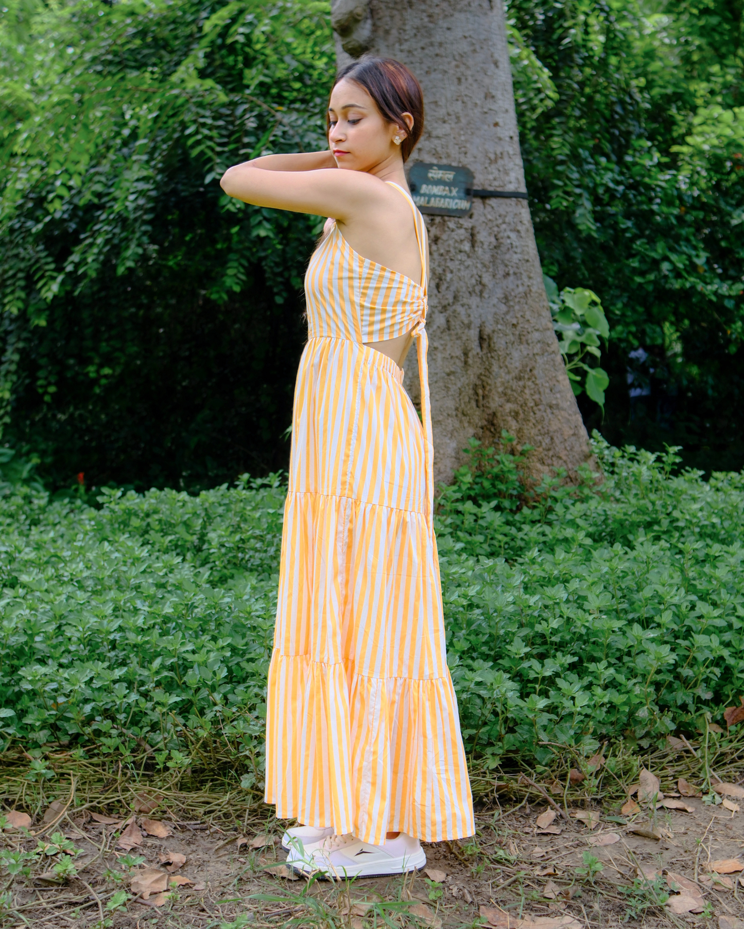 women wearing pure cotton poplin dress by moodora which has back ties and pockets perfect for long days even in summers.