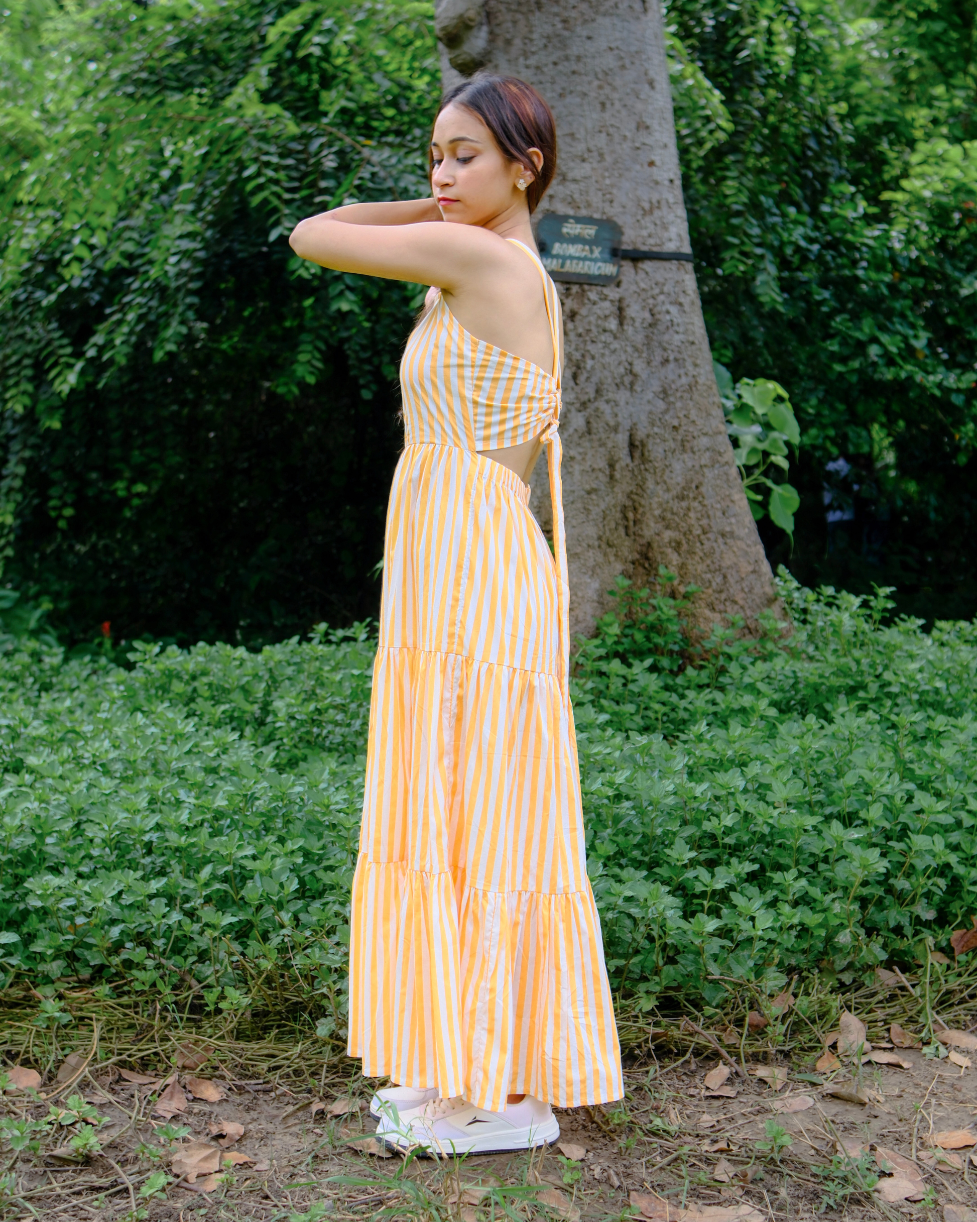 women wearing pure cotton poplin dress by moodora which has back ties and pockets perfect for long days even in summers.