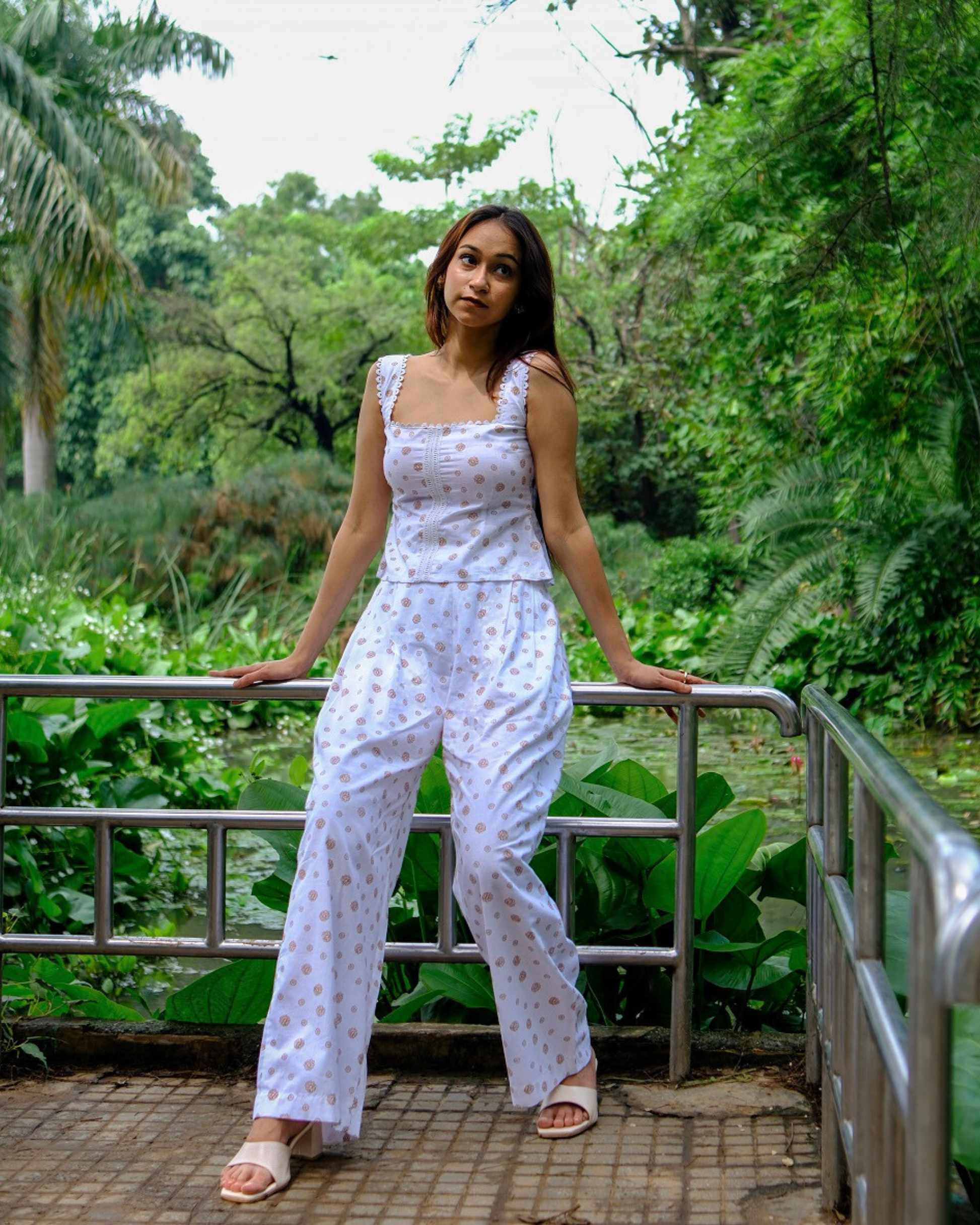 women in a pure cotton white printed top and pant co ord set for summers